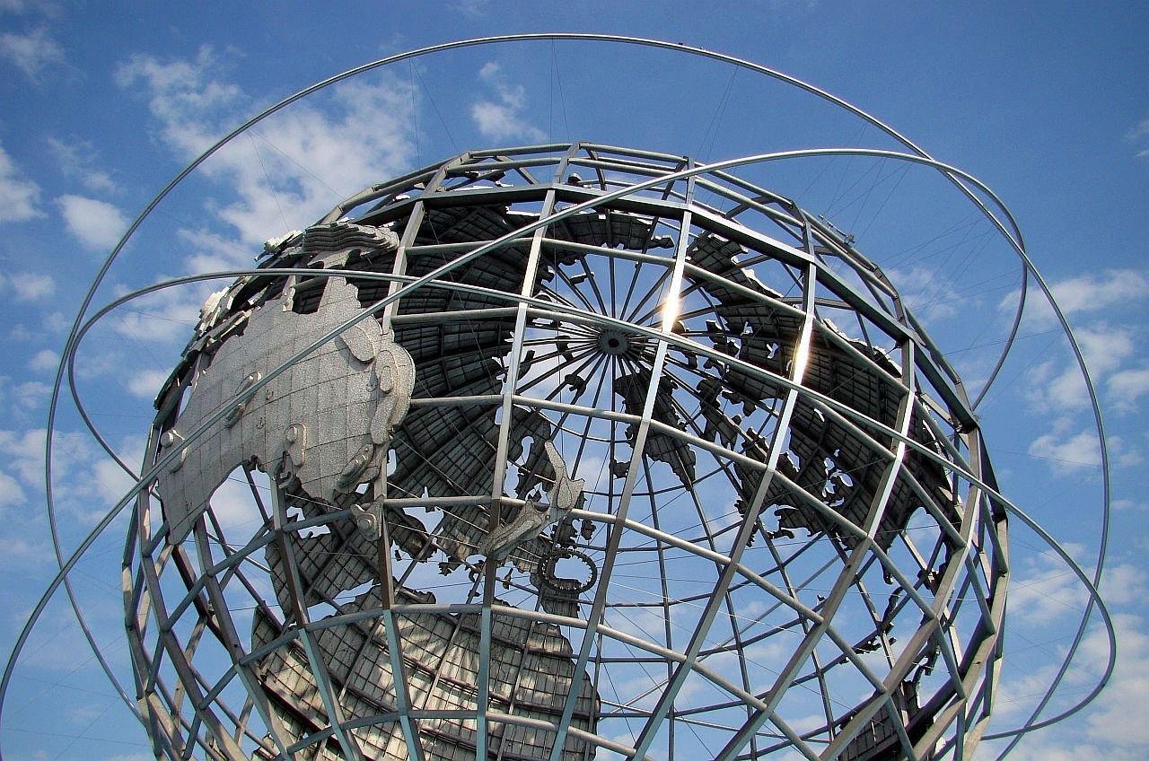 man and woman walking on the street during daytime