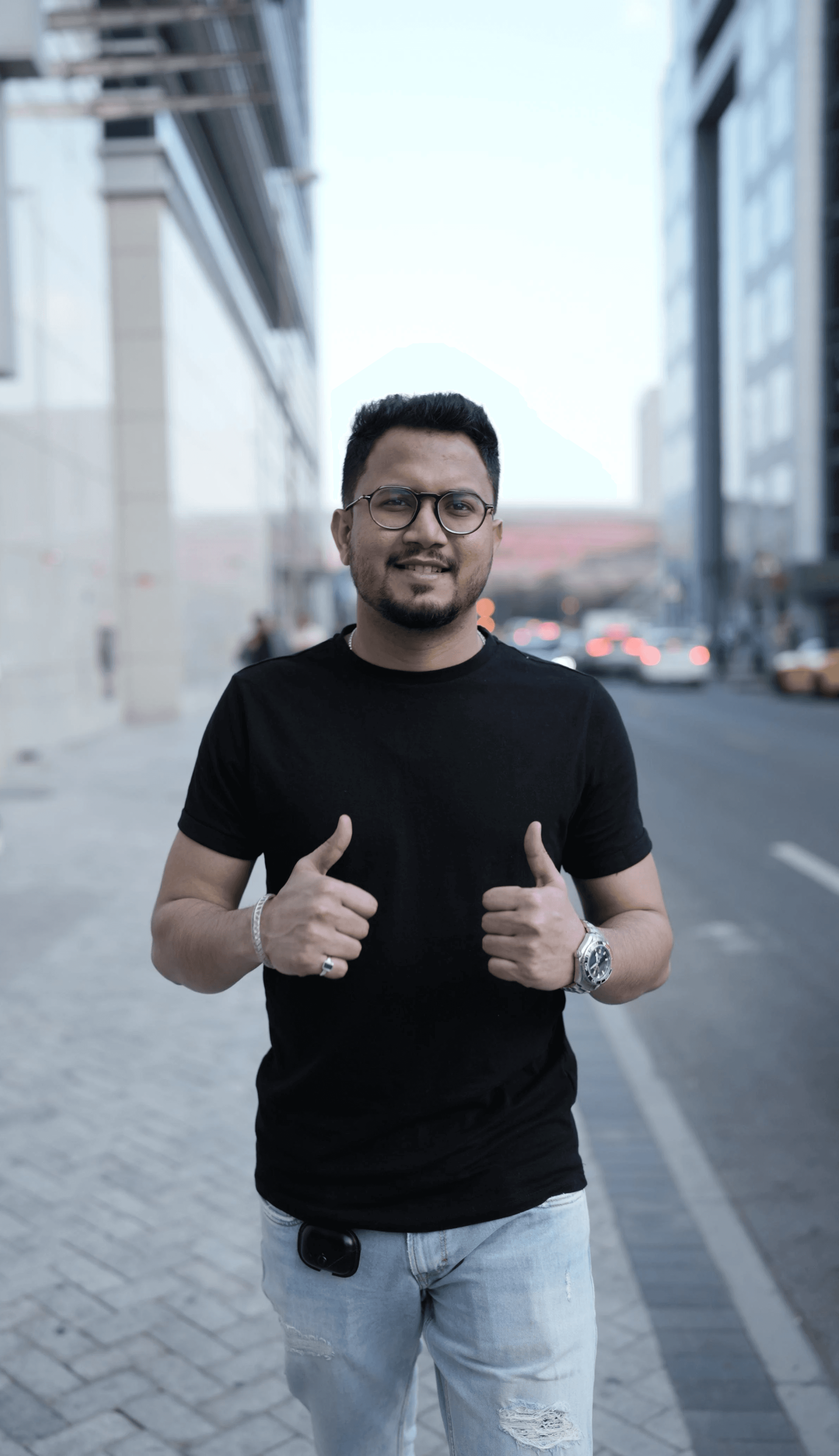clear drinking glass with coffee on top of white table
