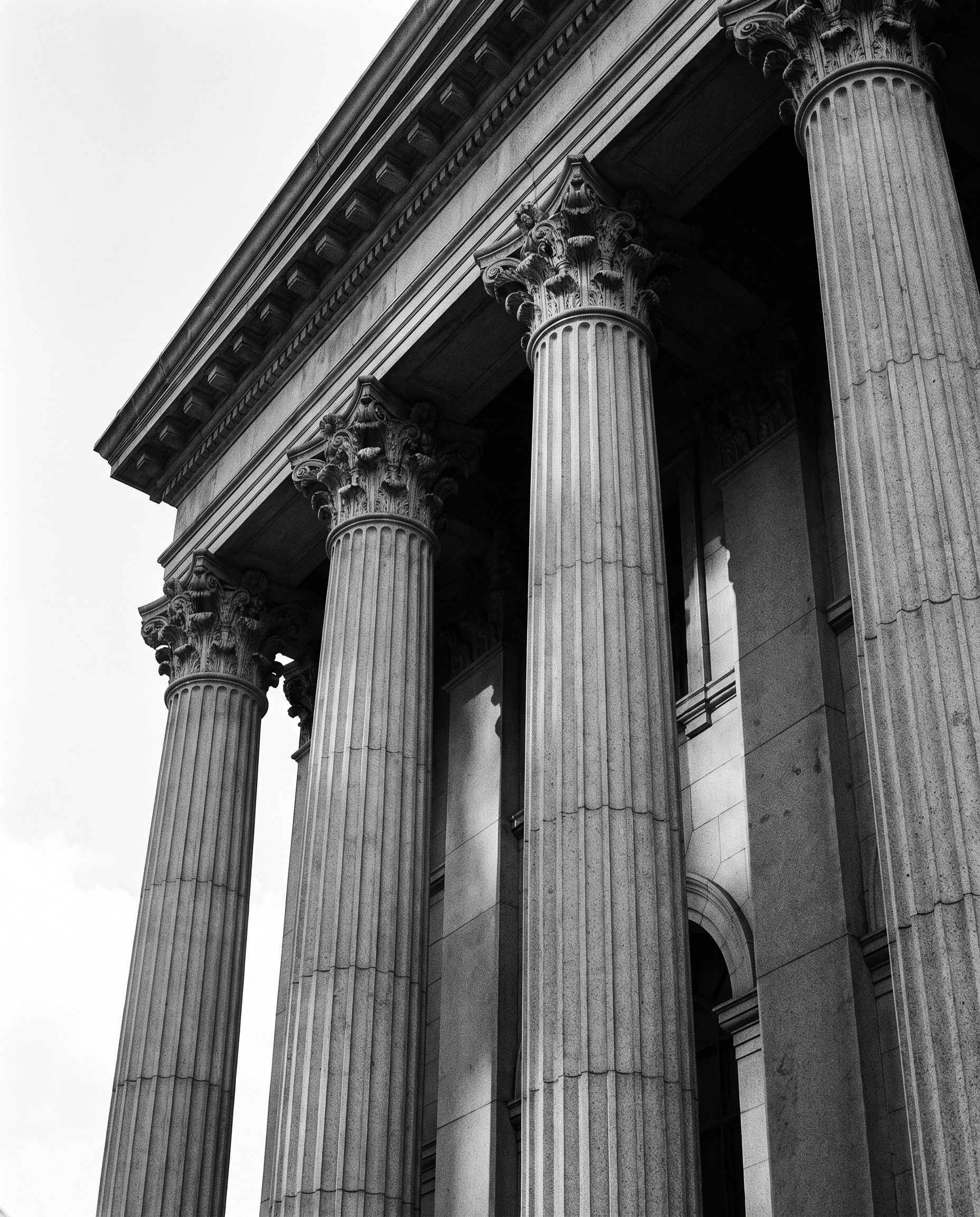 Stone columns of a Wall Street building, New York, black and white