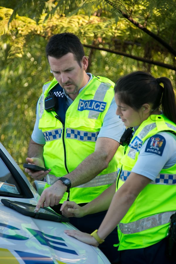 Silhouetted figures engage in a heated argument.