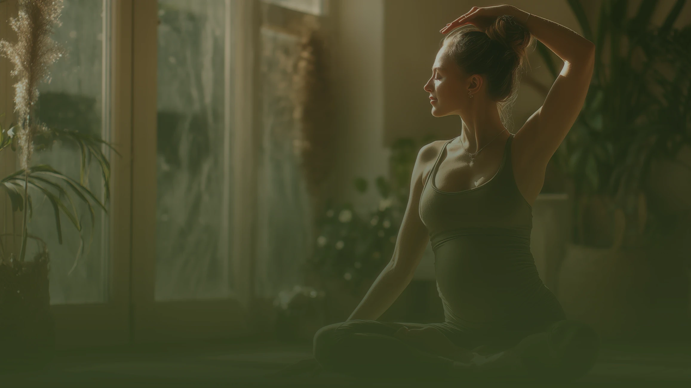 Woman practicing yoga in a calm natural setting