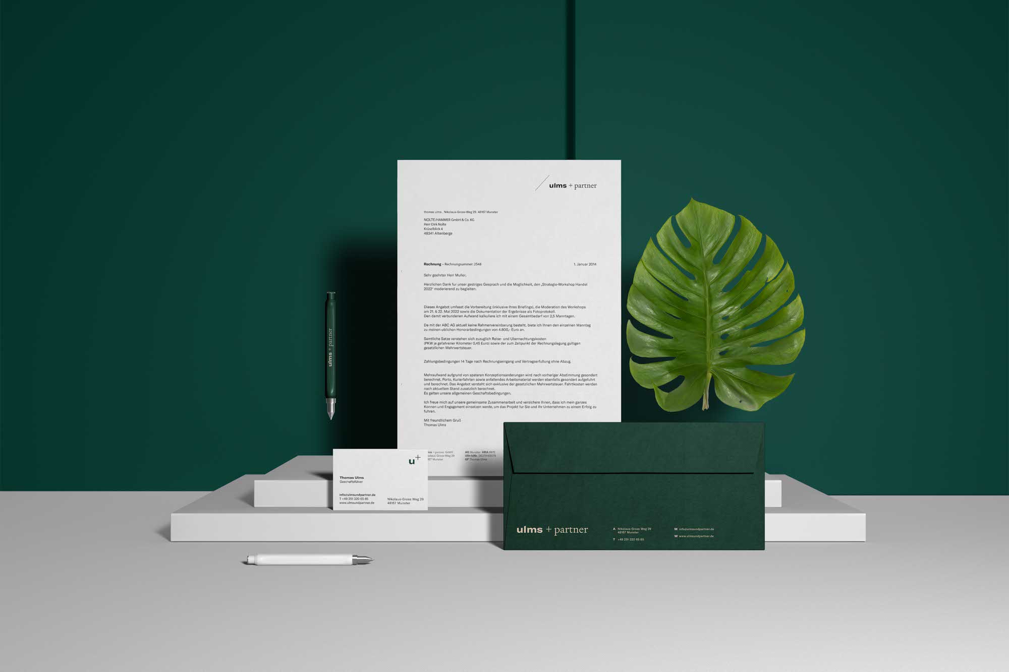 Briefpapier und Visitenkarten für Ulms + Partner – seriöses Design mit Farbwelt in Grün