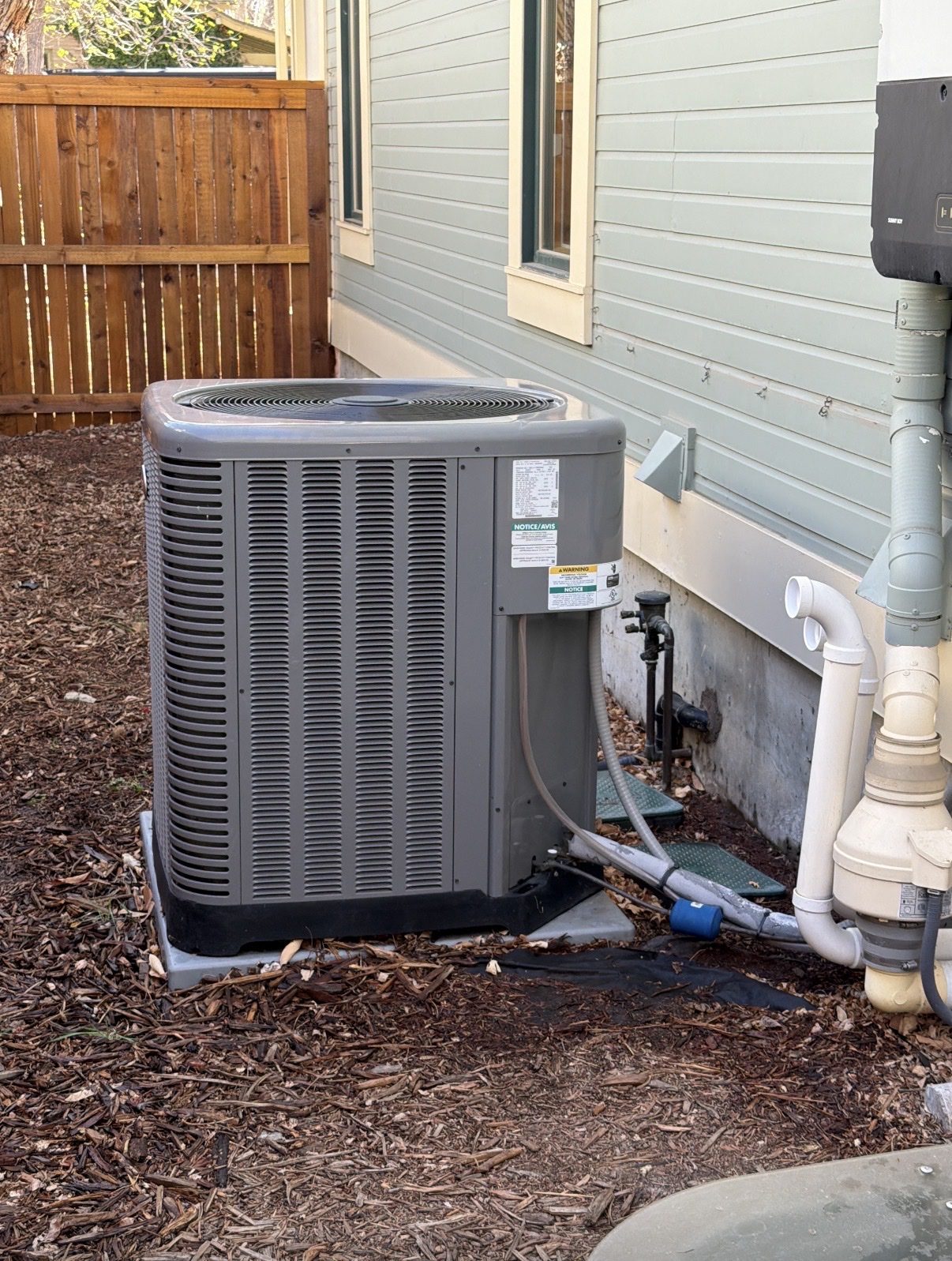 MoJo technician servicing a home system