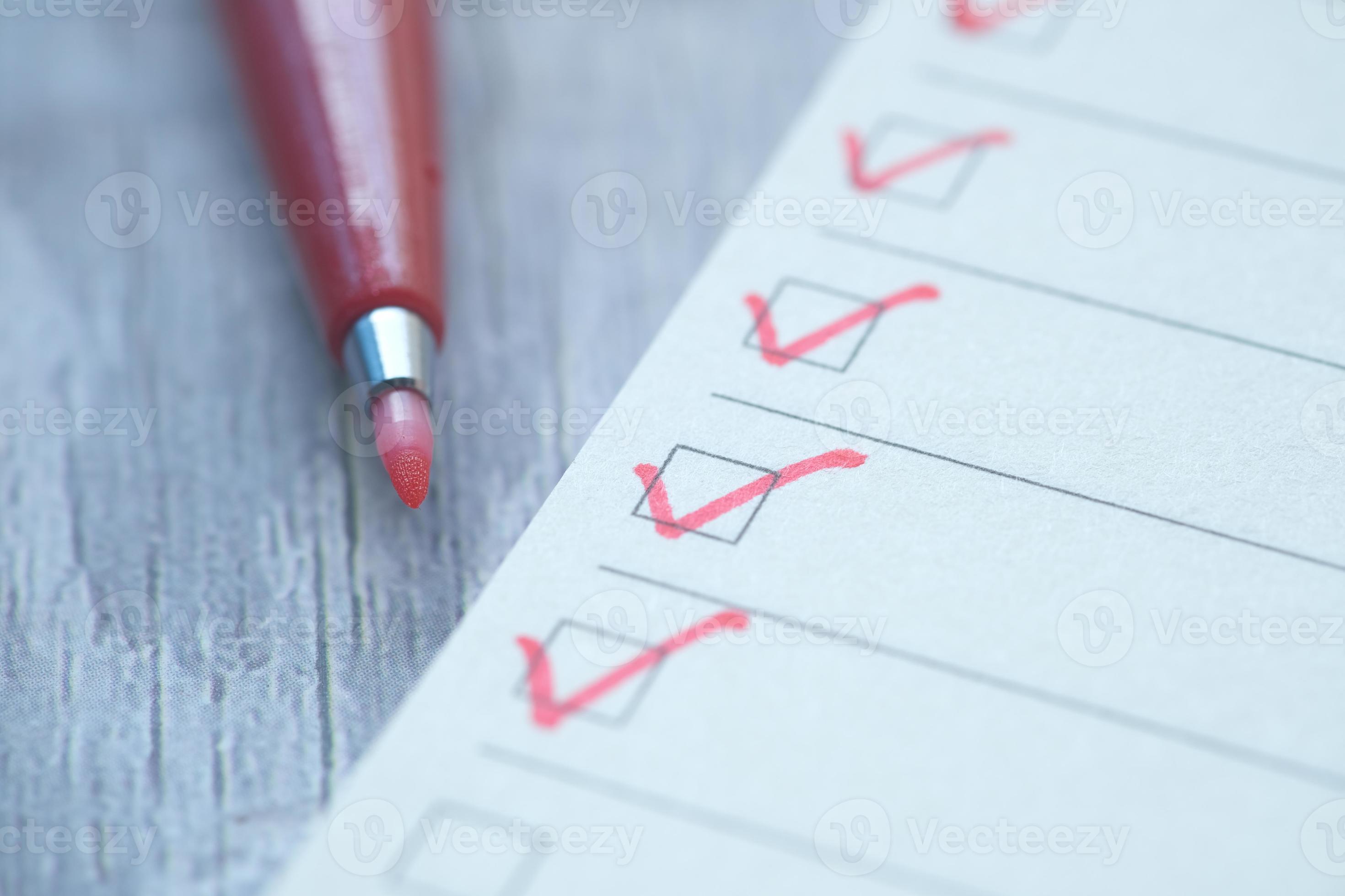 two person shaking hands near white painted wall