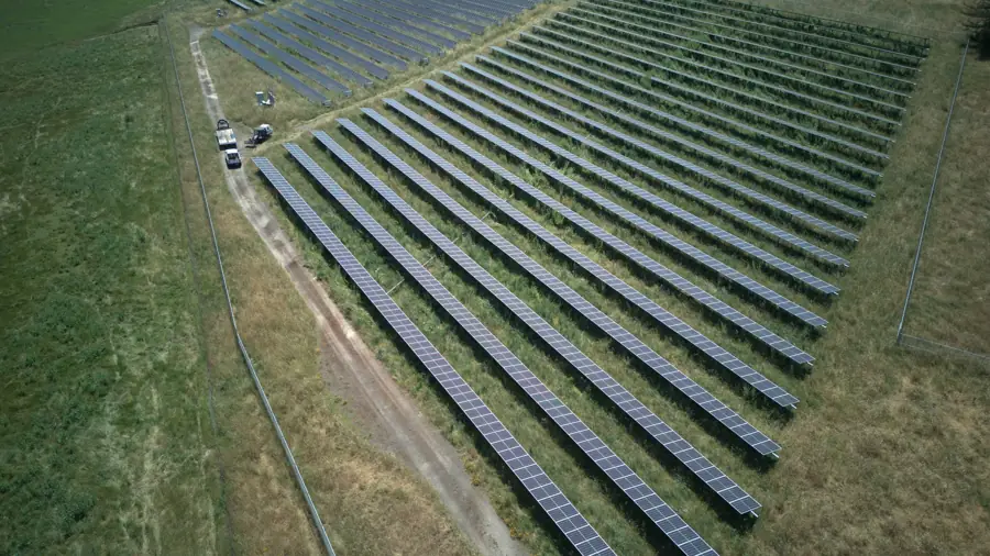 Aerial view of ground-mounted solar rows