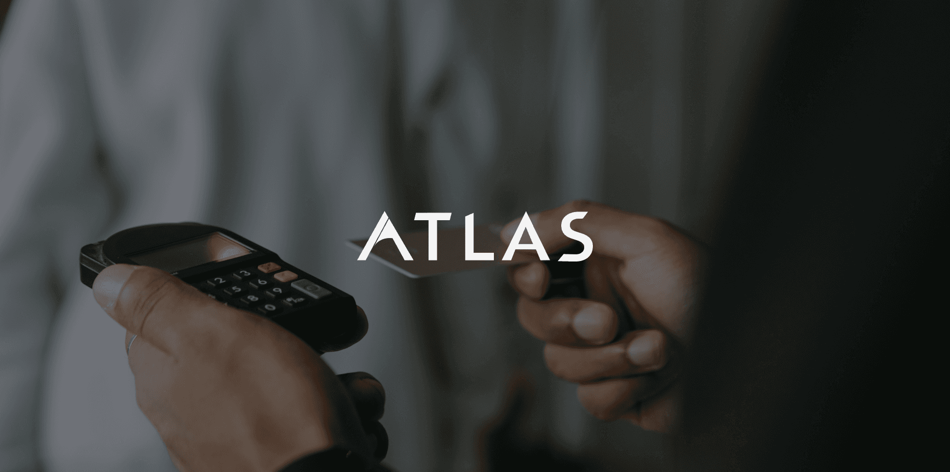 A fast black sports car races down the highway.