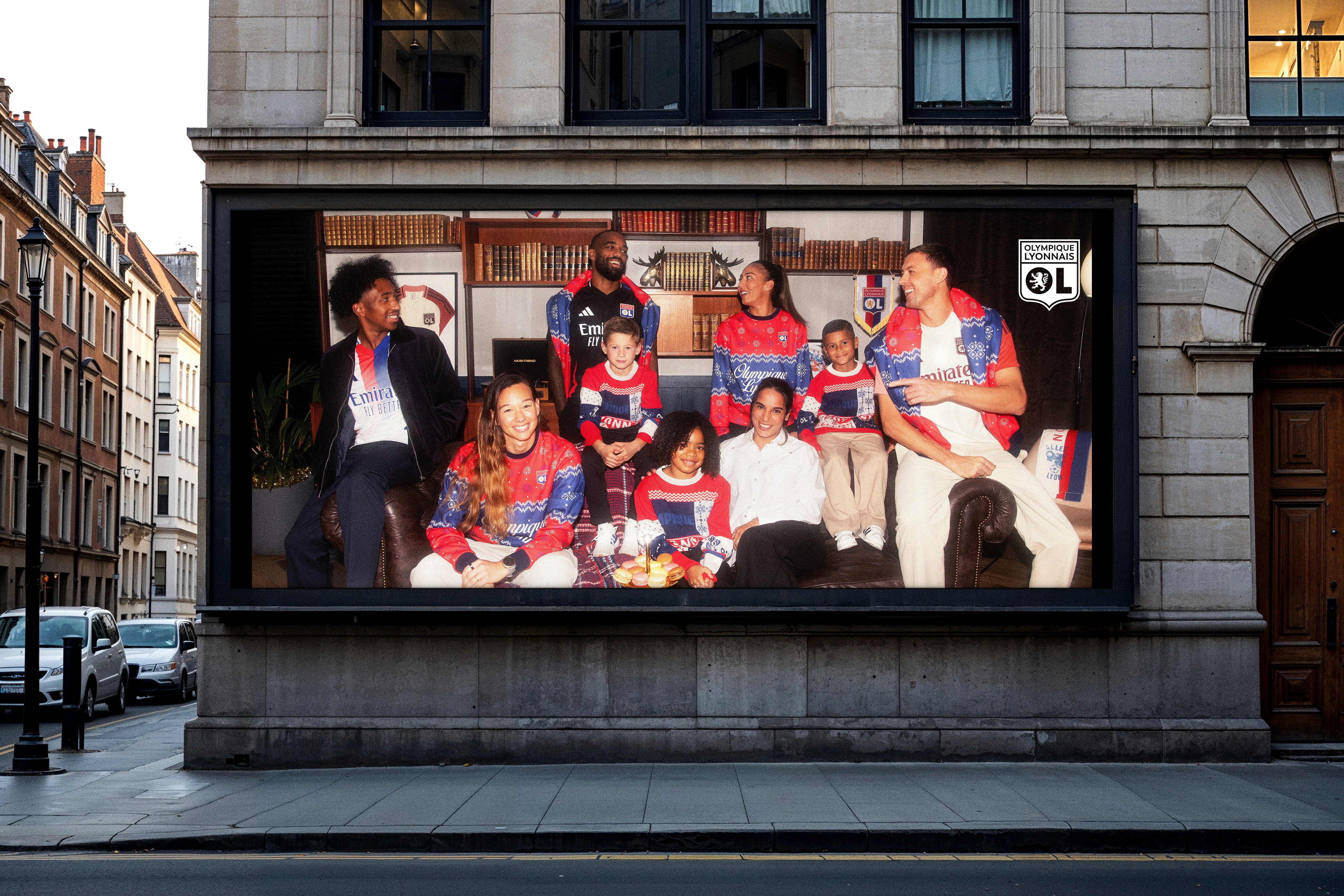 Streetside billboard with flyposters of the Batch.Works brand and illustrations