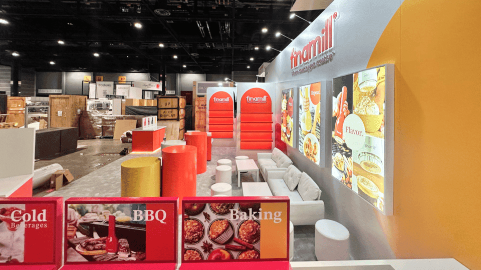Restaurant product display booth with demo counter, foodservice product displays, buyer meeting area, branded graphics, and storage planning