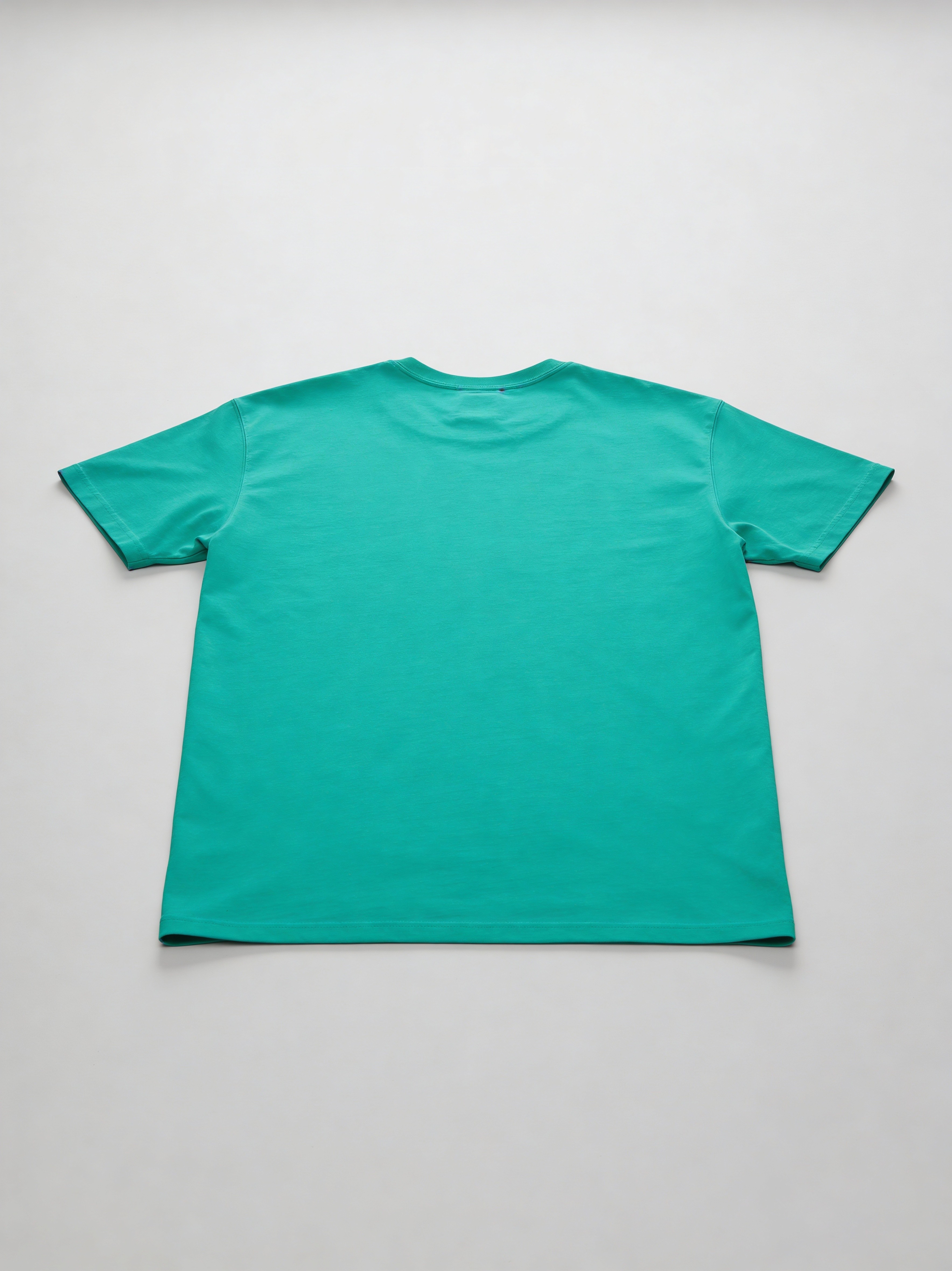 a group of three different colored t - shirts
