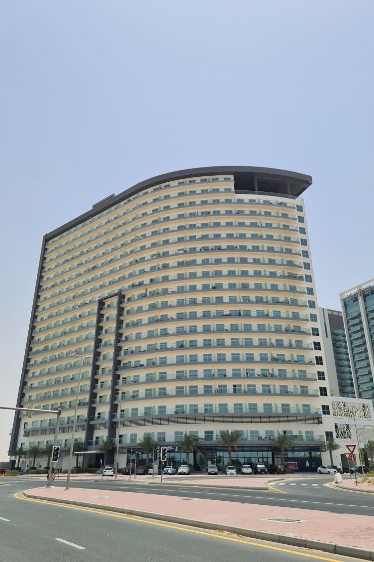 Modern facade of Bella Rose. Real estate specialists ready to assist with your next luxury property purchase.