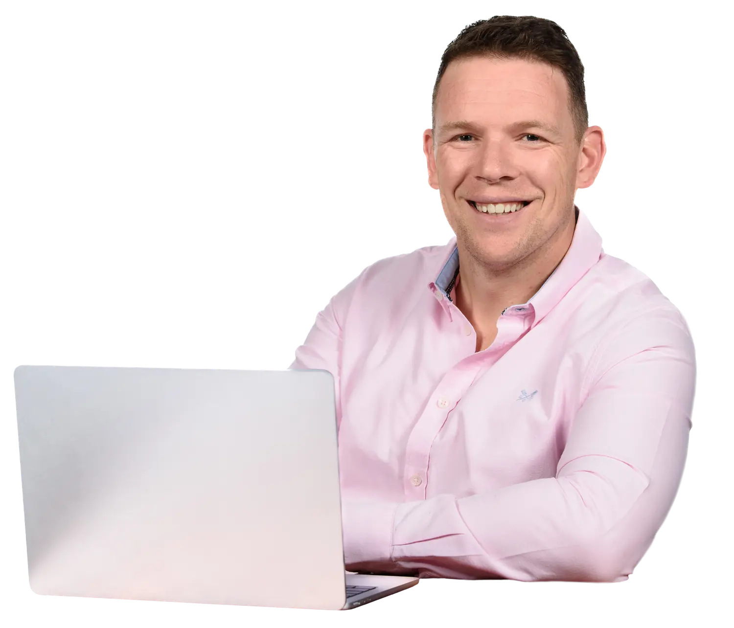Photo of Will Sparks, founder of SparksWealth, sitting with a laptop