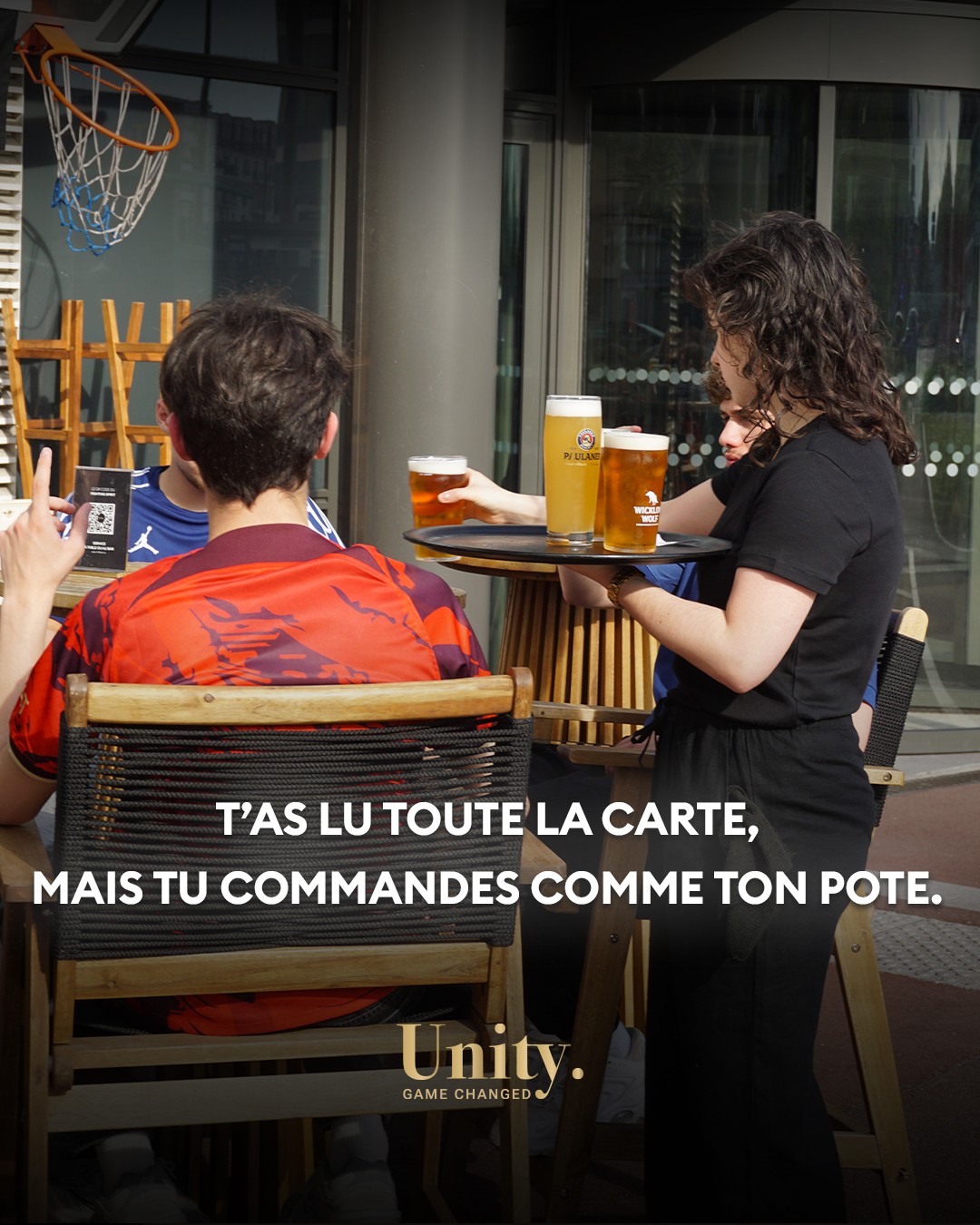 Entrepreneurs engaging in a lively discussion during a Bizz Buzz networking event.