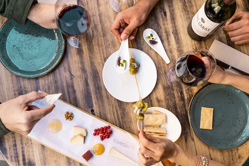 Spanish tapas and wine pairings during a Barcelona food and wine tasting experience.