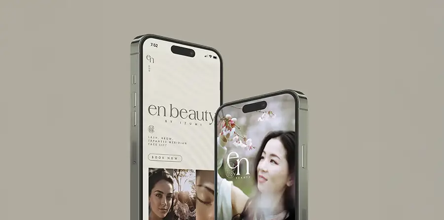Two mobile devices showcase the en beauty website working on mobile.