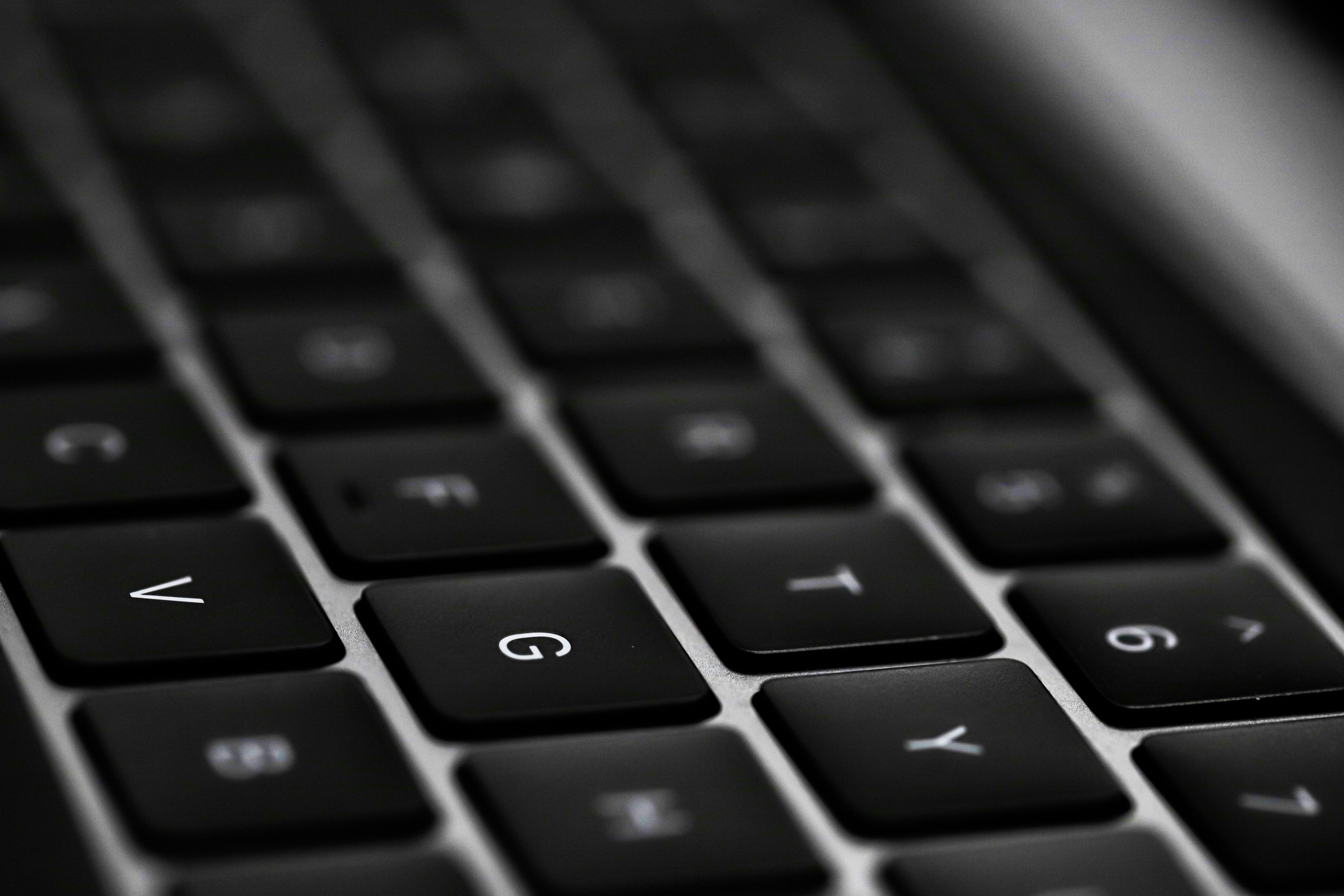 black and silver laptop computer