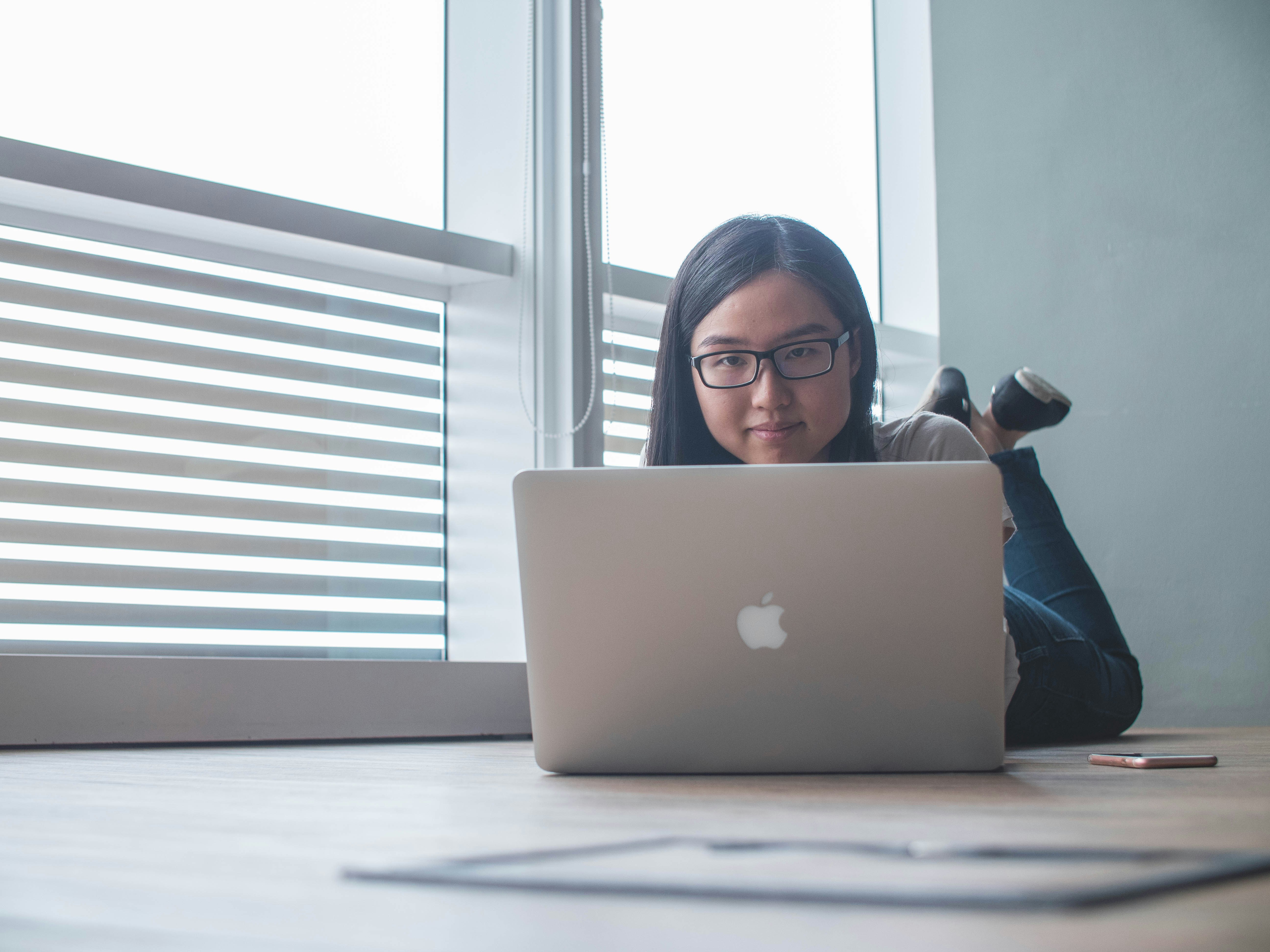 person on computer working with option AI