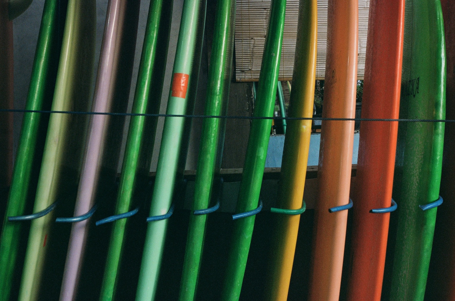 film photography of the colorful surfboards 