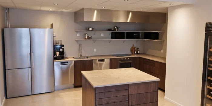 a man in a yellow shirt is working on a roof