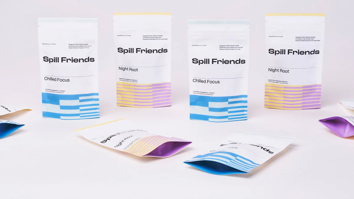 A glass filled with liquid sitting on top of a table