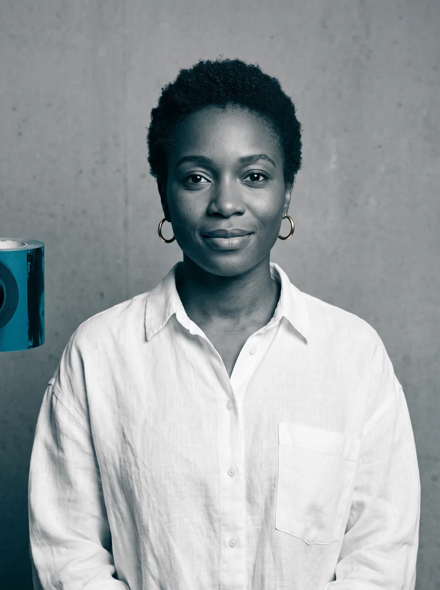 Black-and-white portrait of Adaeze in a white shirt