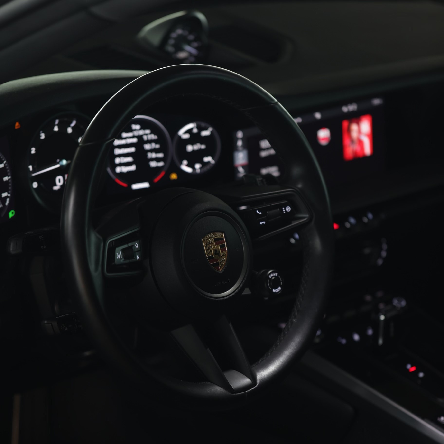 Luxurious interior of the Porsche 911 Carrera S, showcasing premium leather seats and advanced technology – ideal for luxury car rental Miami.