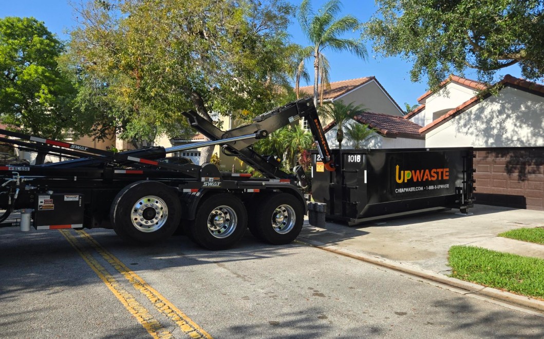 Dumpter outisde of a residential house