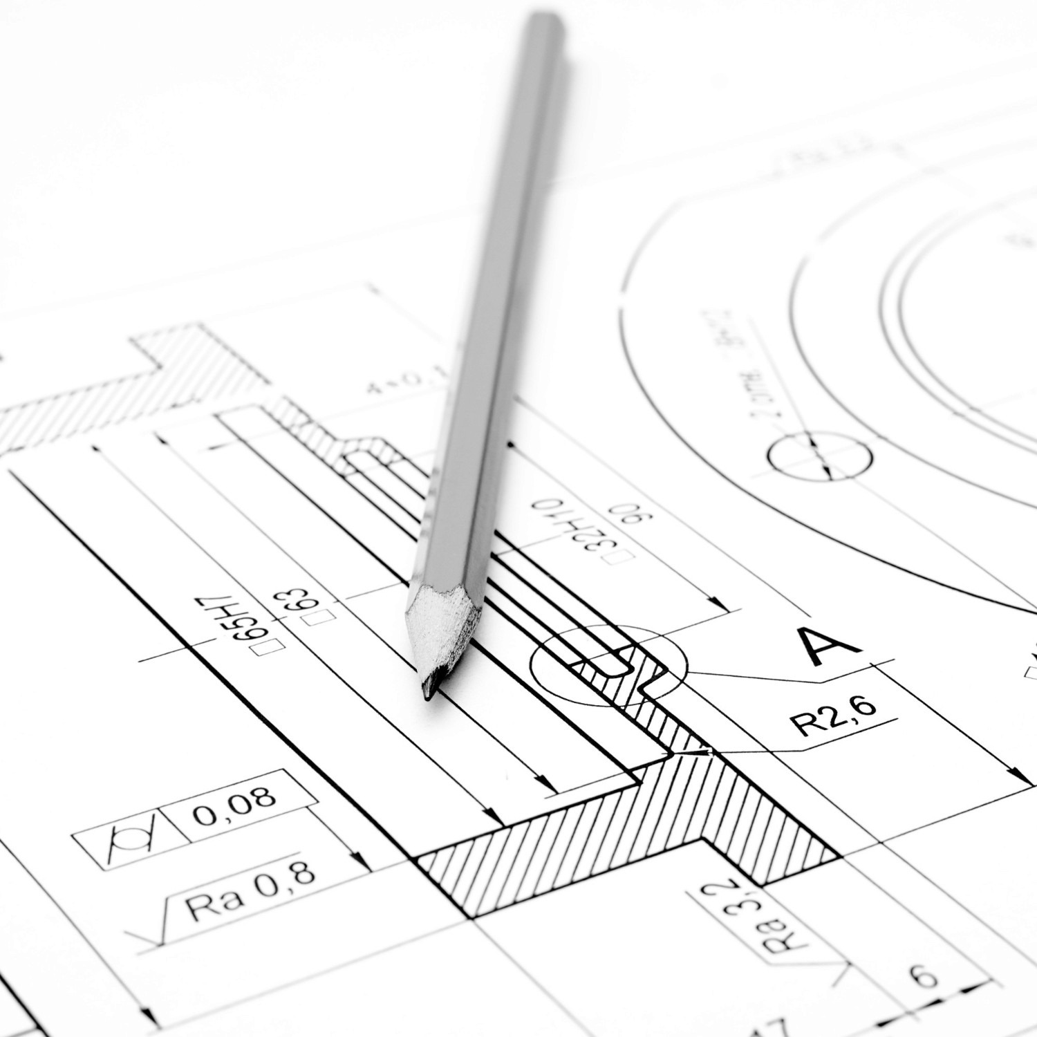 Technical drawing with a pencil laying on the paper