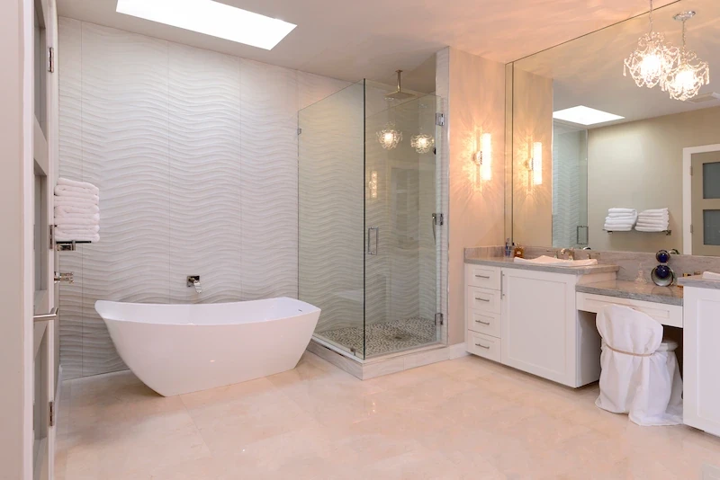 Luxurious Harbor Ridge Transitional Remodel bathroom with freestanding tub and glass shower.
