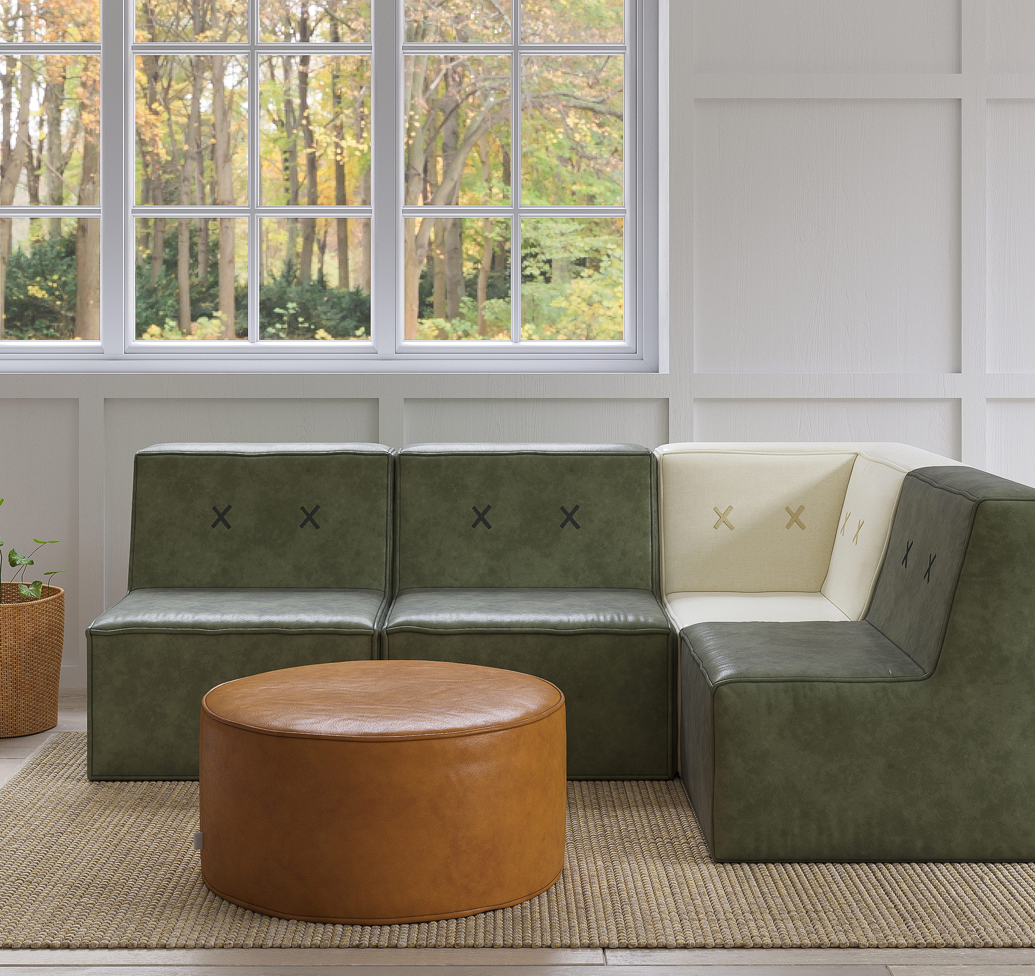 Modern living room with L-shaped modular sofa and ottoman in natural light setting