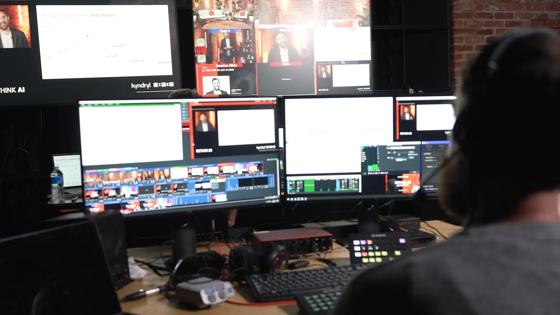 Live vision mixing desk showing multiple camera feeds, slides and branded graphics during the Wired x Kyndryl livestream.
