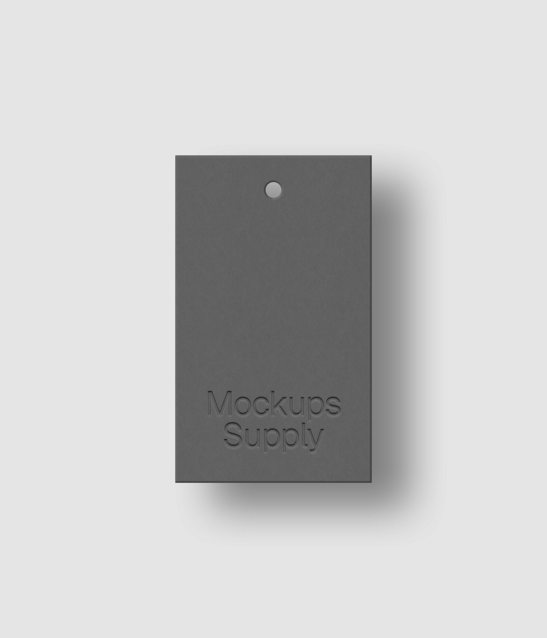 Gray 3x5 retail swing tag mockup on white background with realistic debossed logo effect and shadow for Photoshop download psd