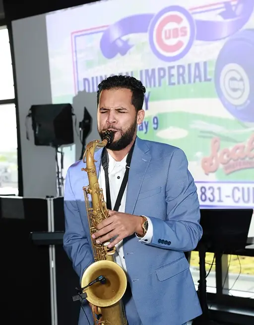 Chicago saxophonist DG Sax playing the saxophone at a Chicago Cubs event