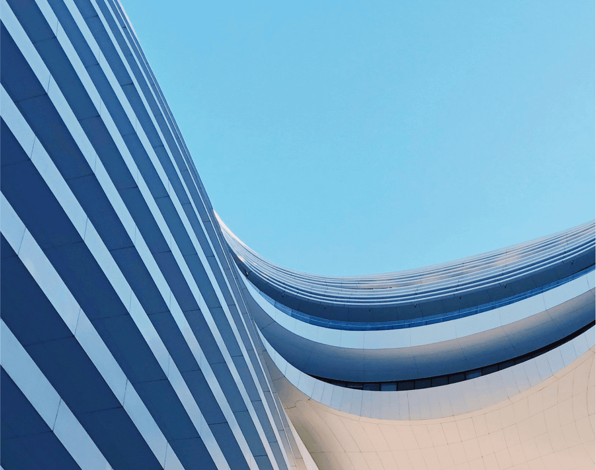 five children smiling while doing peace hand sign