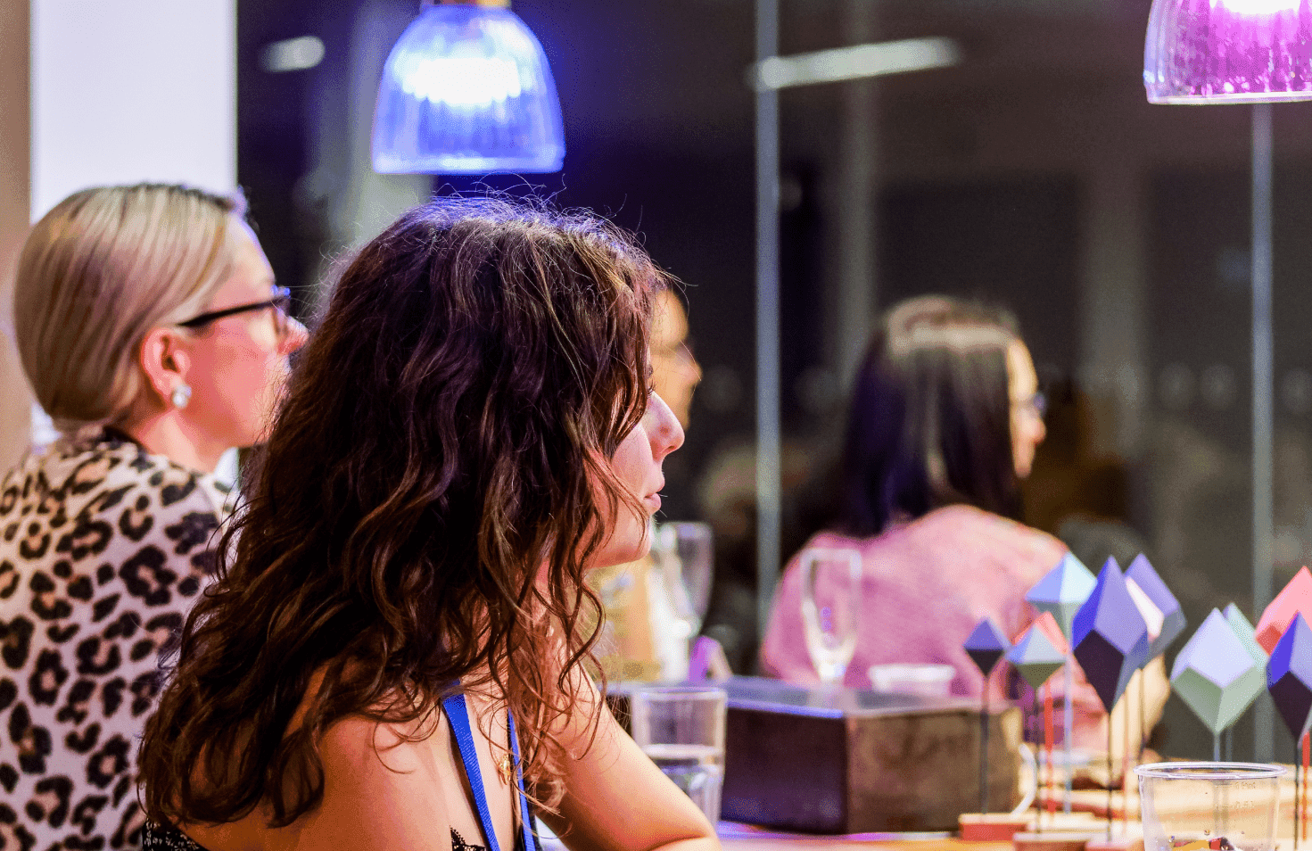 People sitting at an indoor cafe.