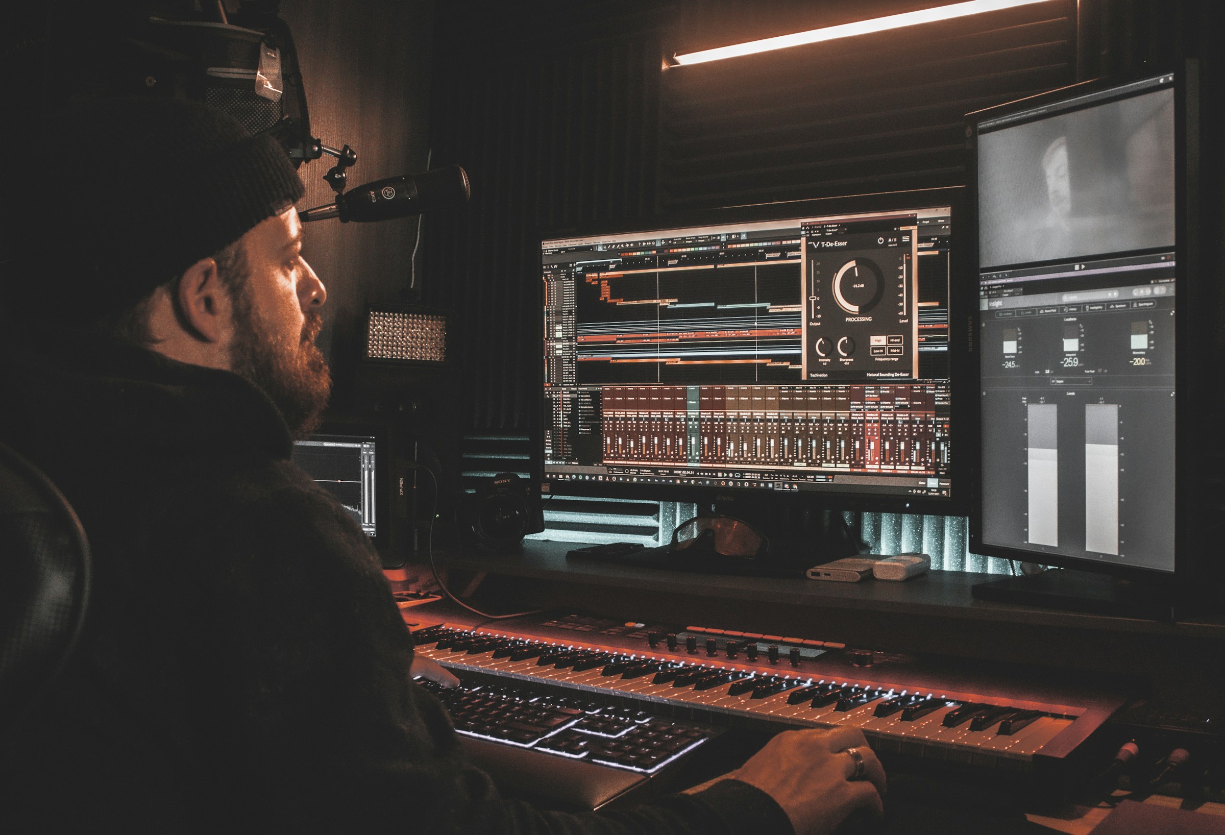 man working from studio - What Does a Music Producer Do?