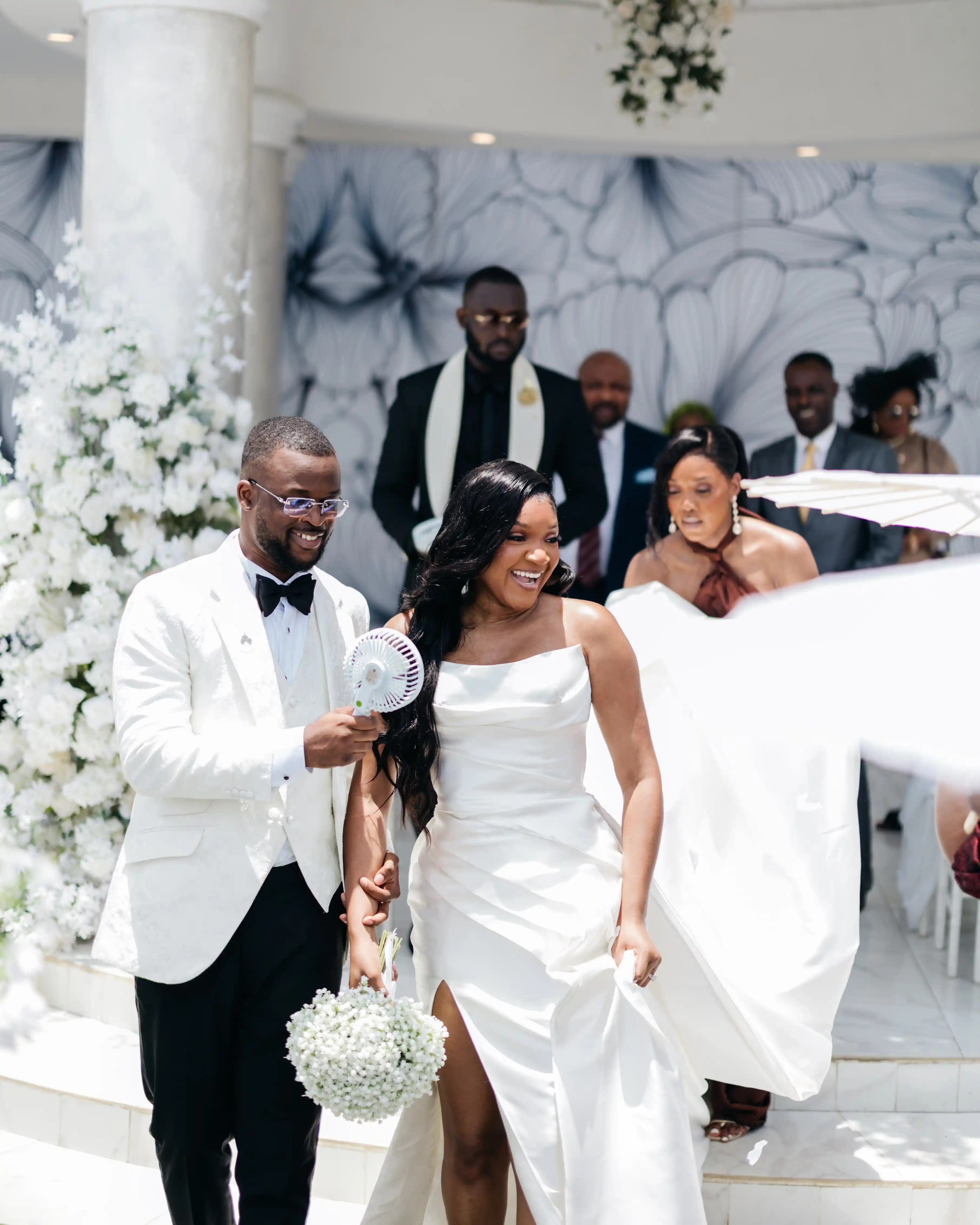 Bride and groom celebrating a luxury wedding coordinated by Victoria Brooks Events, a premium wedding planner in Nigeria.