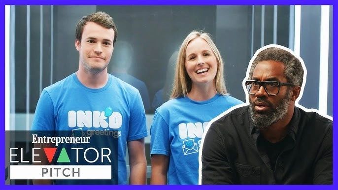 a black and white living room with a large tv