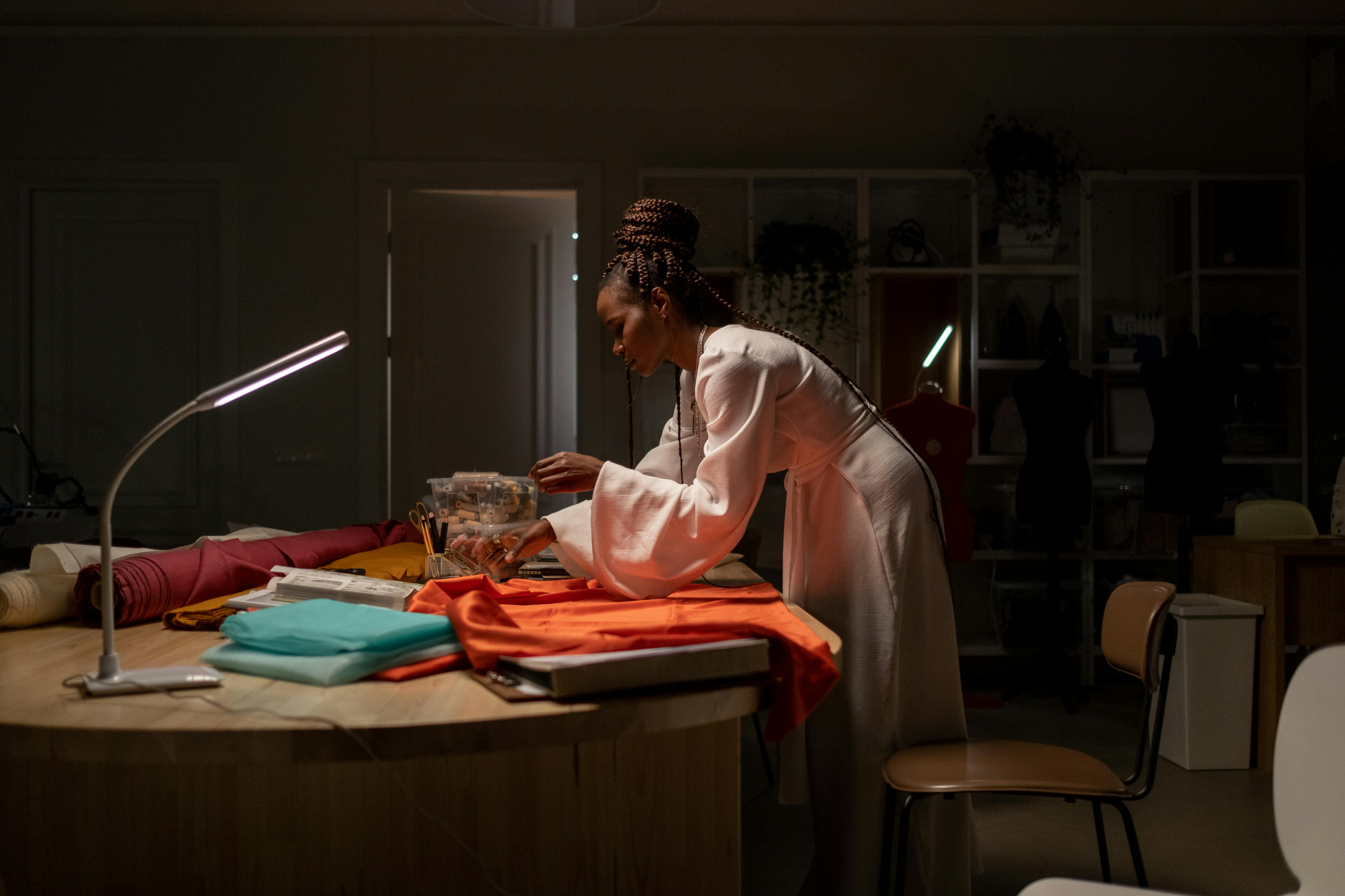 Woman designing fabric in a studio