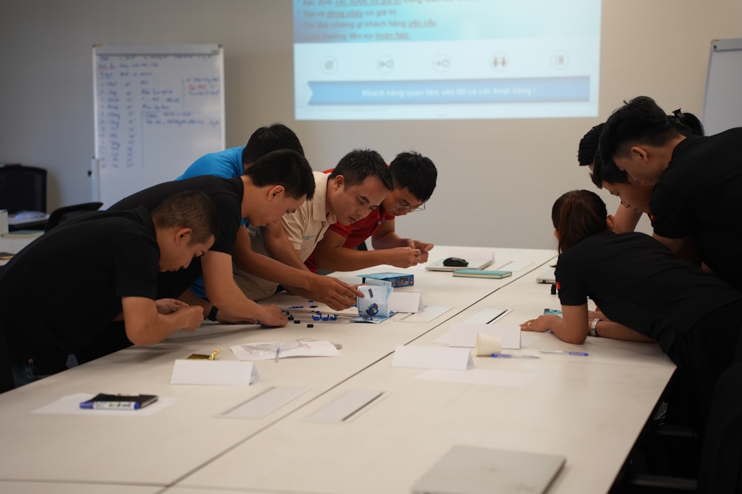 Strategic website planning session with team members looking at wireframes - Ecommerce website redesign