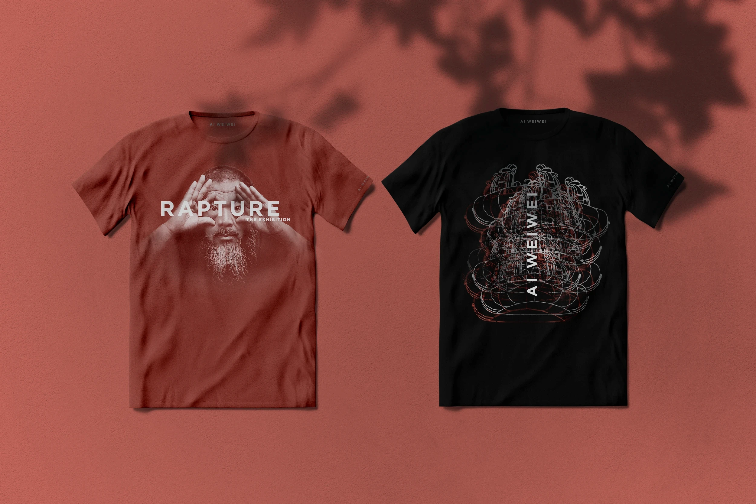 Exhibition merchandise design for Ai Weiwei’s “Rapture” featuring graphic t-shirts with contemporary artwork and typography.