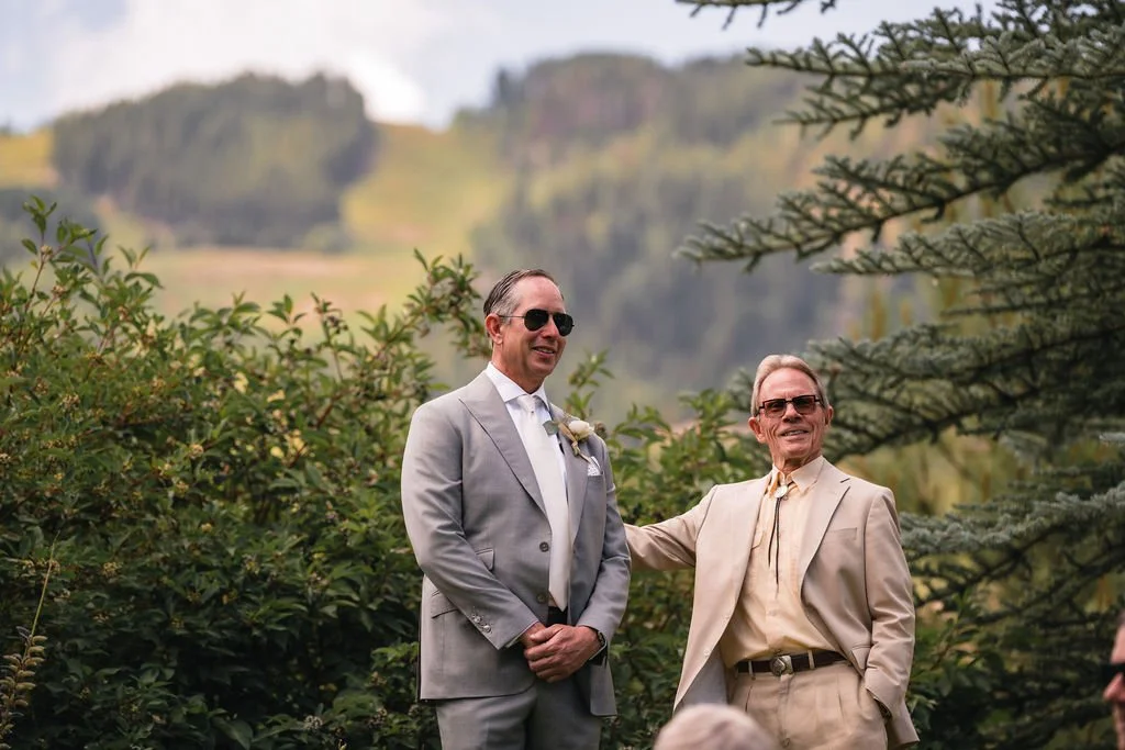 Couple seated together during Bosq Aspen wedding ceremony