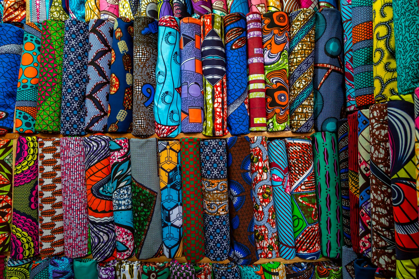 Rows of vibrant African textile patterns