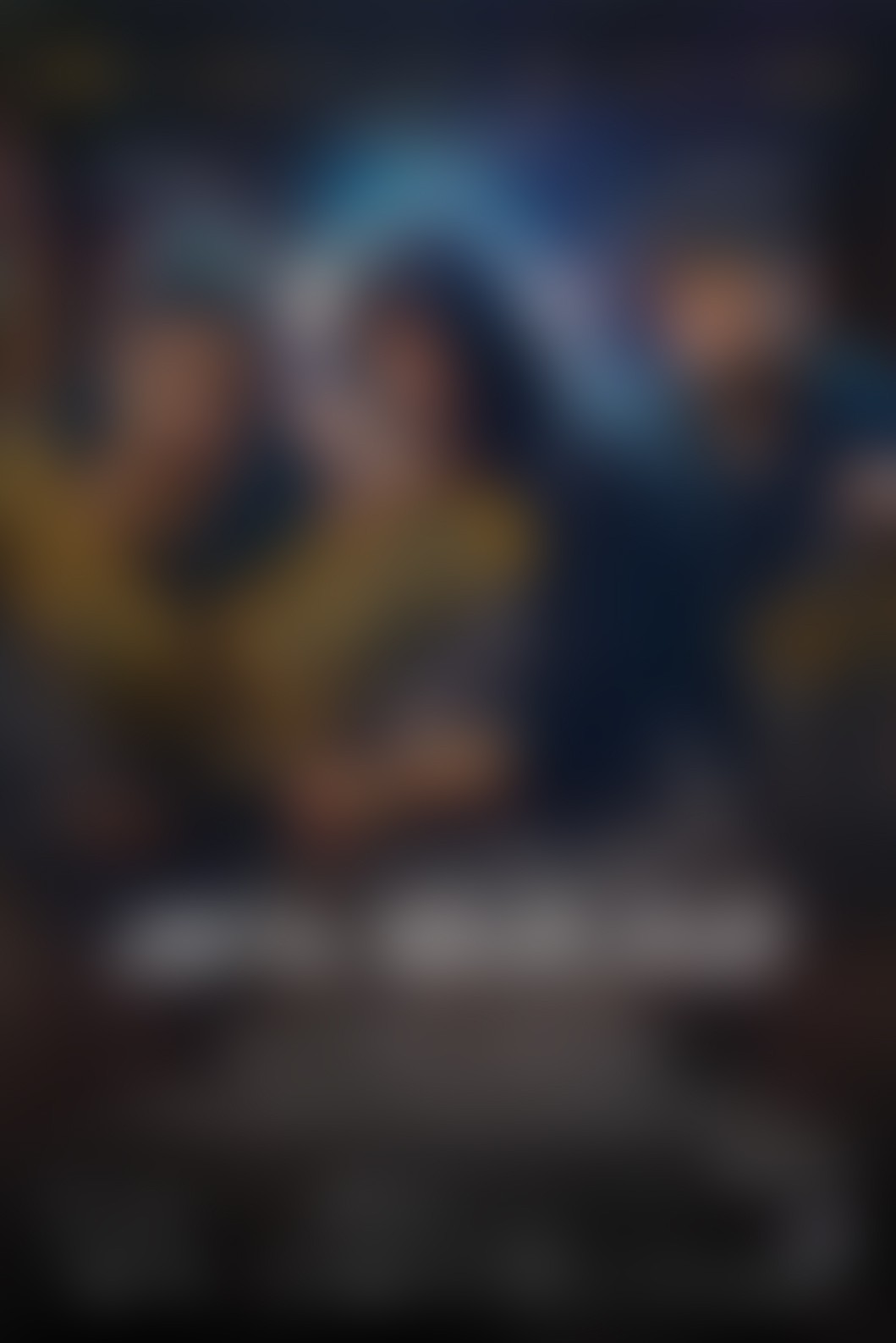 A smiling young man with crossed arms, wearing a plaid shirt and white t-shirt, poses against a dark background.