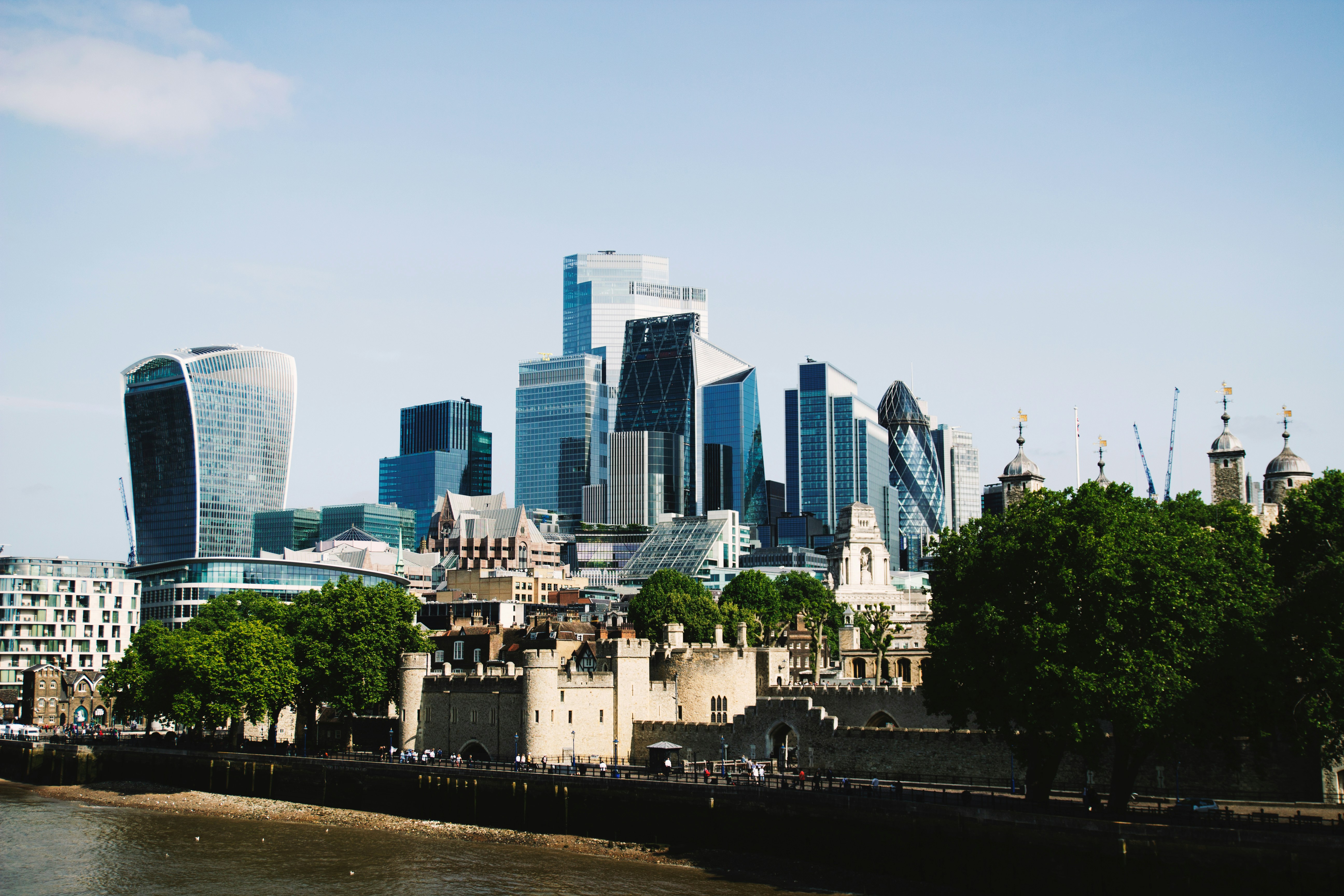Modern skyscrapers behind historic london buildings