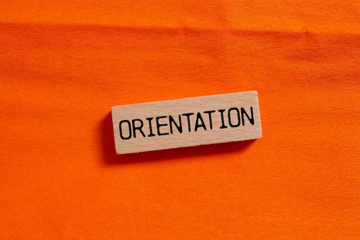 man holding white prove them wrong signage