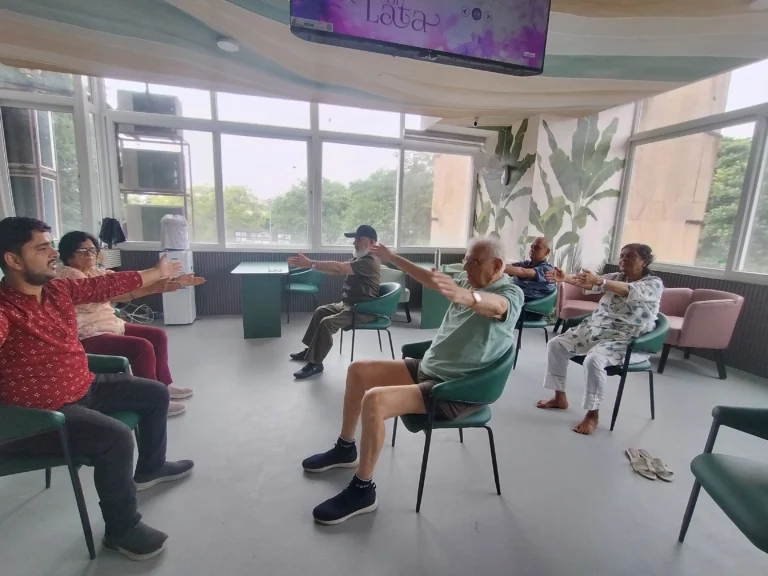 Members at Aamra Seniors Club Gurgaon taking part in group physiotherapy, larger image