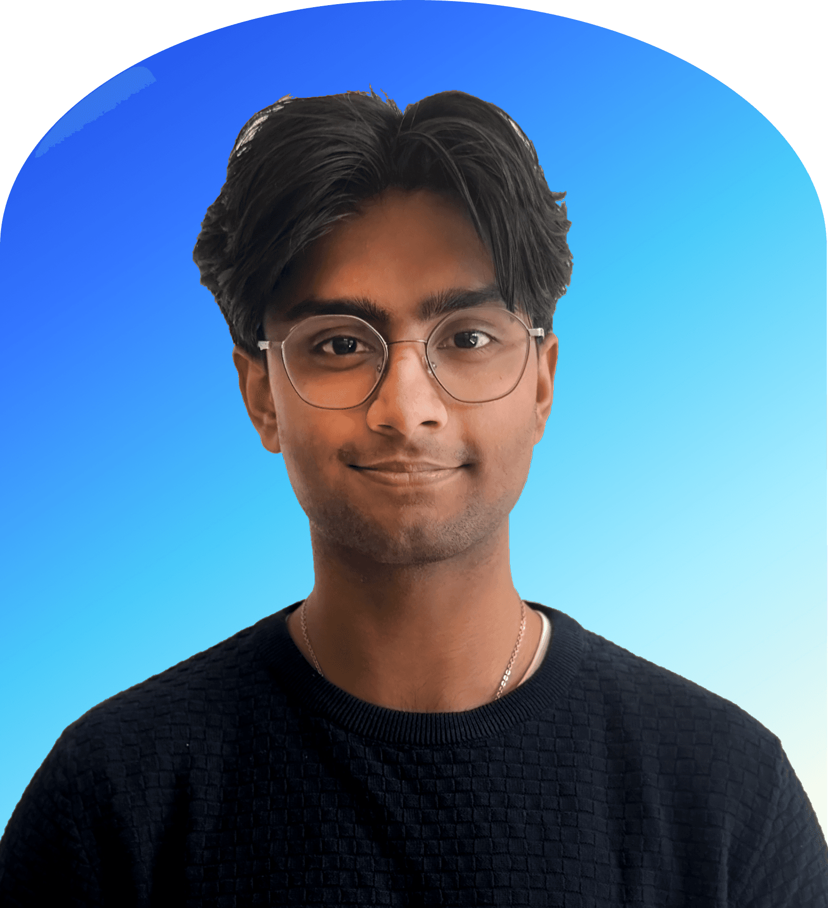 A person with glasses and a black shirt.