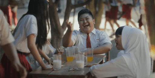 Children gathering and interacting in warm school environment during National Children’s Day campaign for Gramedia, produced by Visual Producer Indonesia