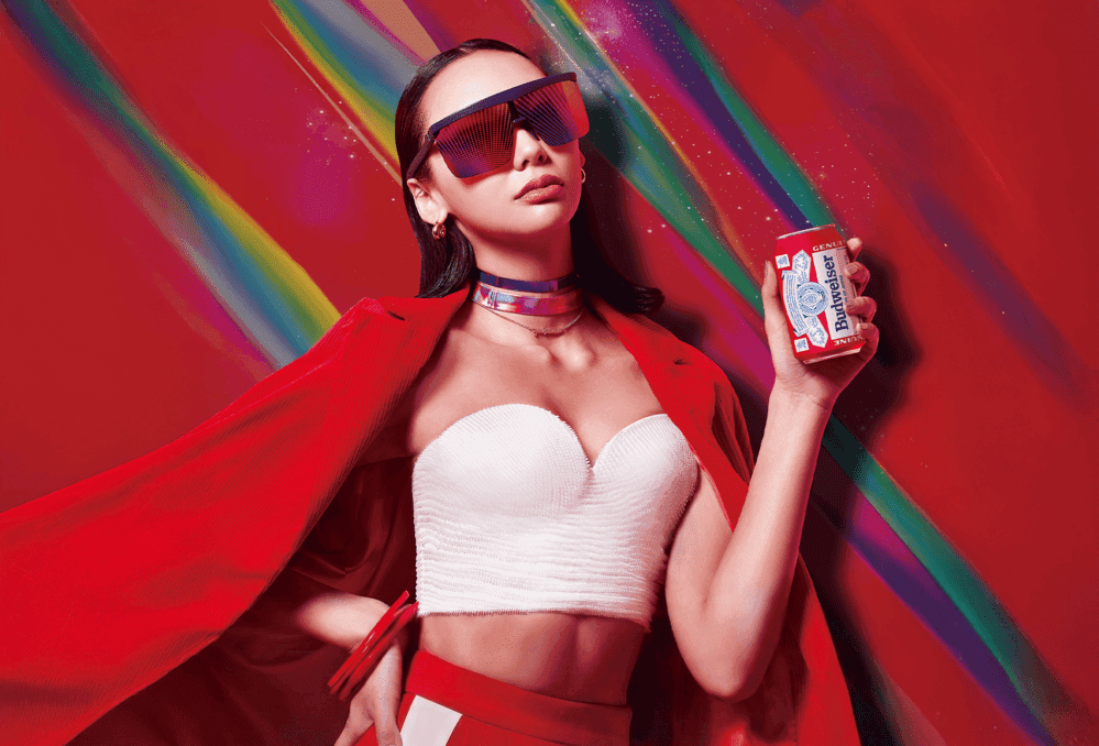 Man wearing sunglasses with water falling on him