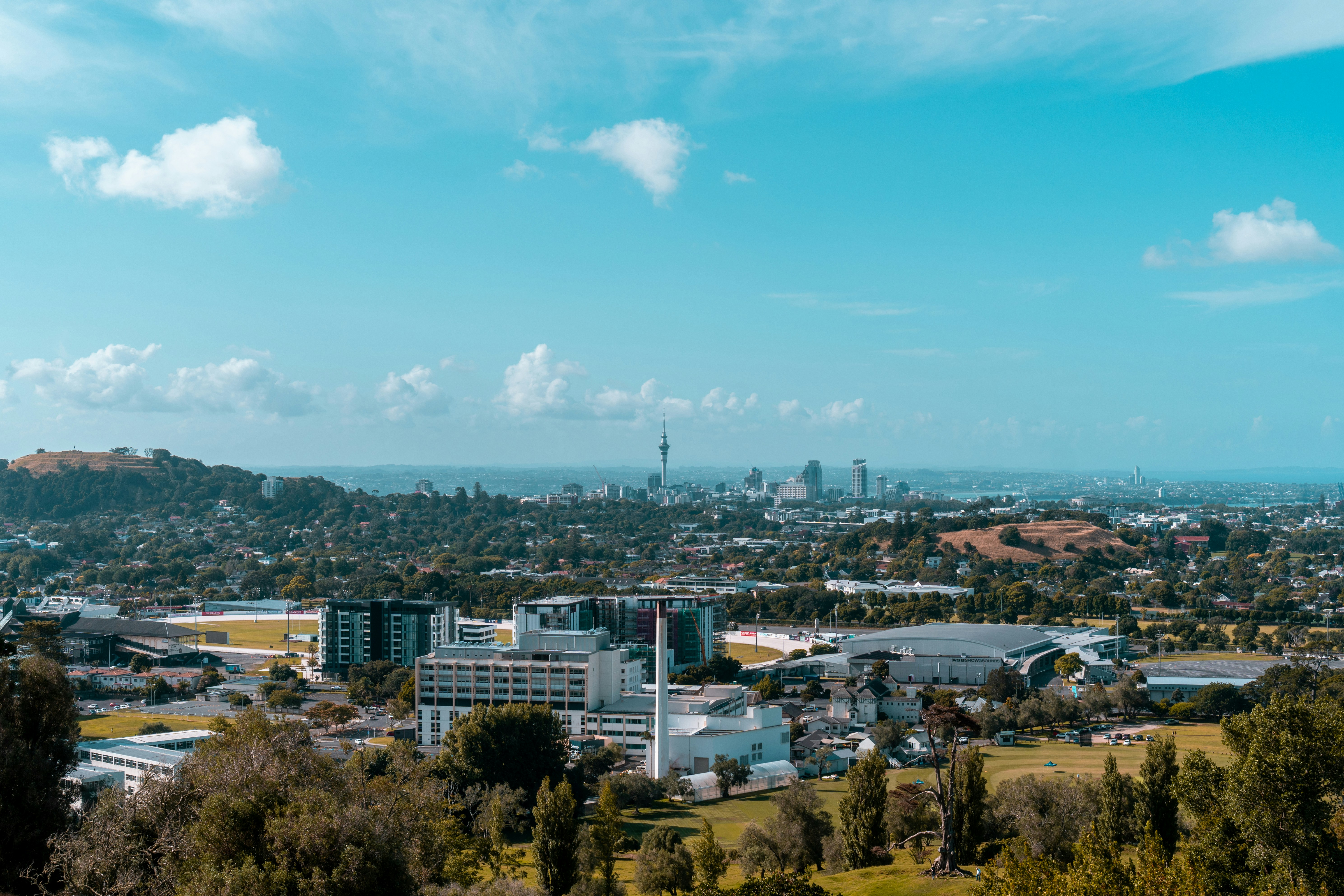 city buildings under blue sky during daytime